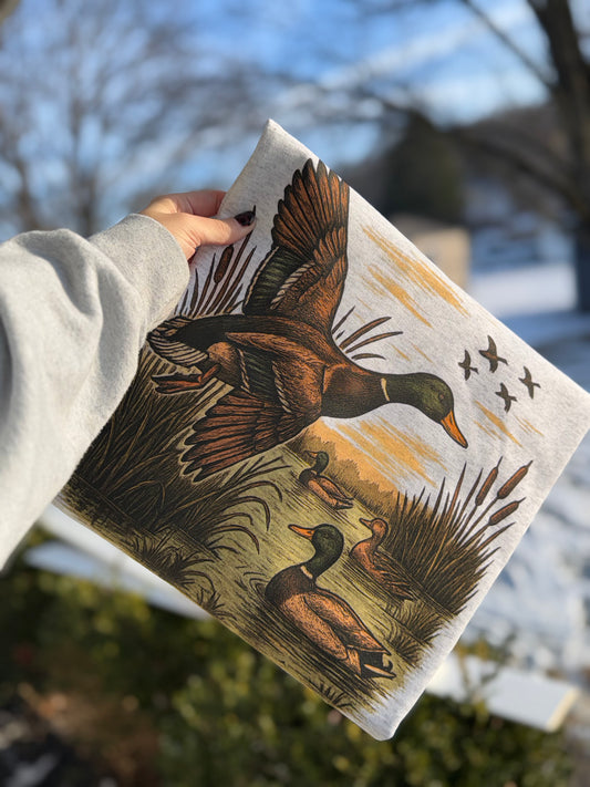 retro flying mallard duck